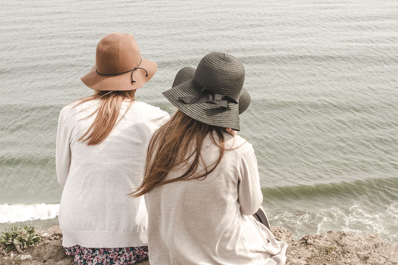 photo of two women at the beach